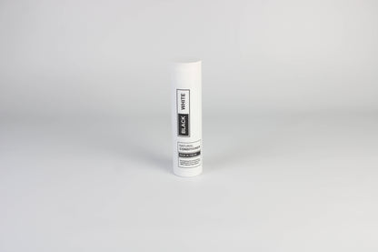 A photo of Black & White's Natural Conditioner against a white background. 