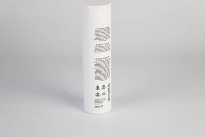 A photo of the back of Black & White's Natural Conditioner against a white background. 